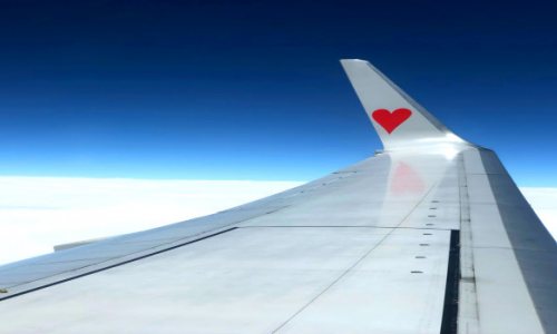 Middle-seat flyers win BIG with free upgrades from Stella Artois!